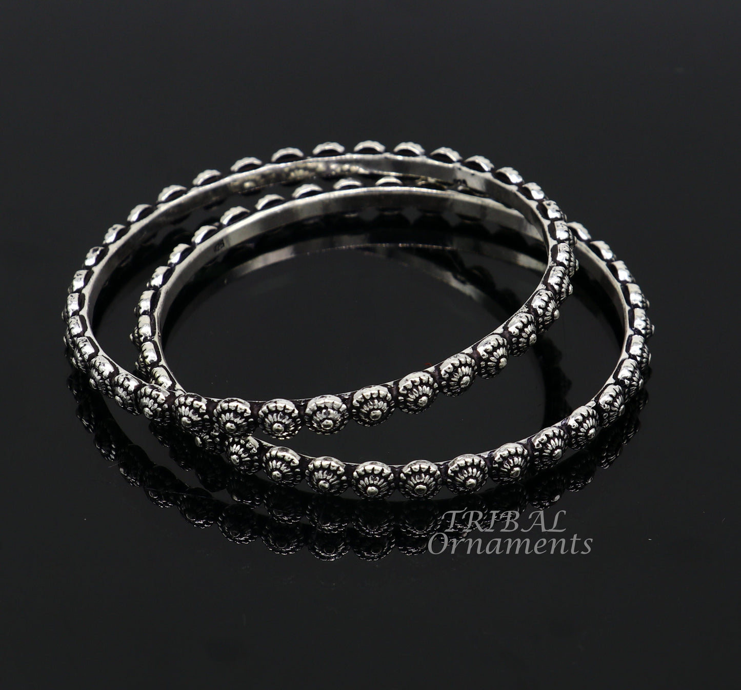 Elegant 925 sterling silver flower design bangle bracelet from TRIBAL ORNAMENTS, ideal for wedding jewelry and brides collection.