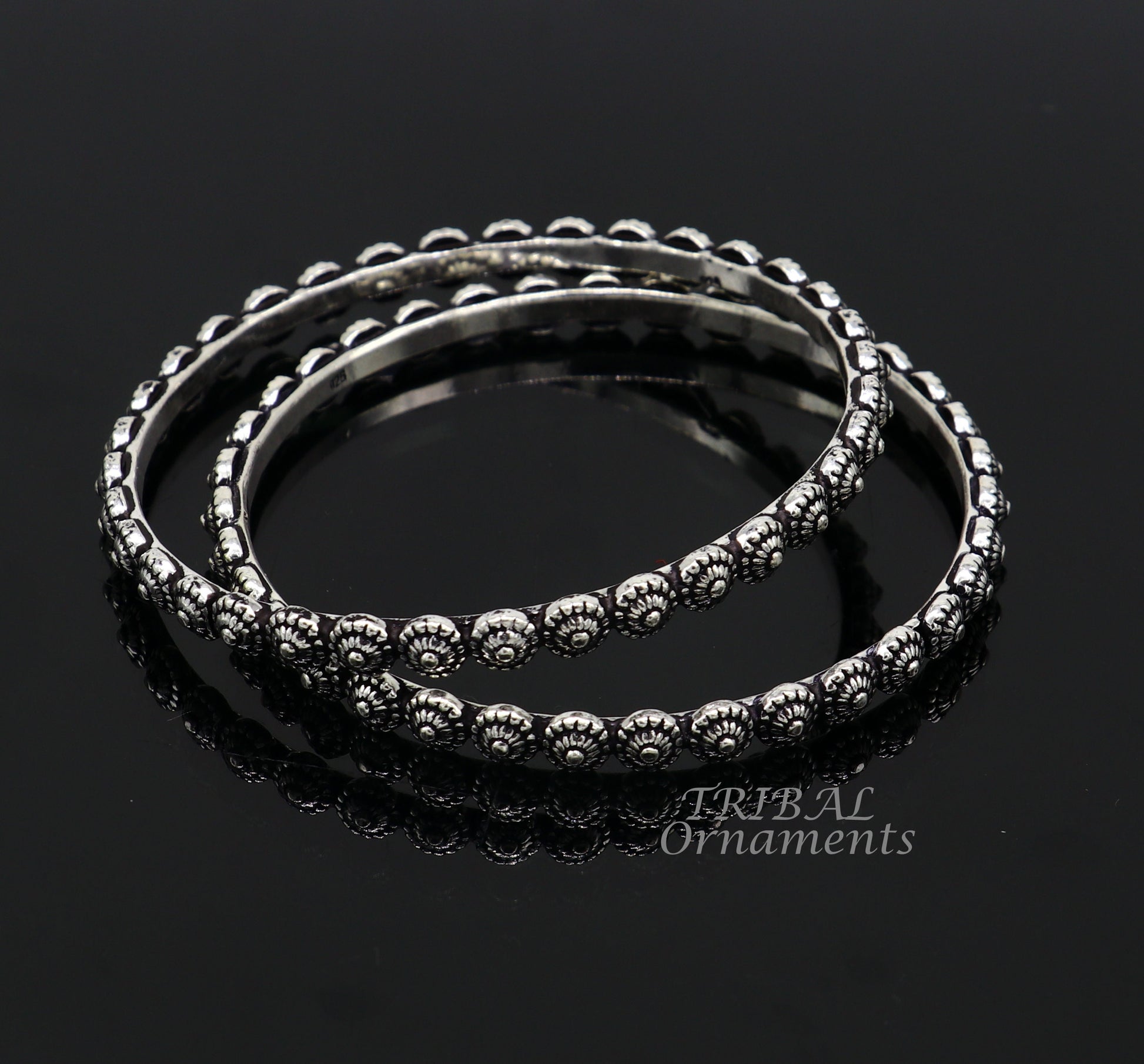 Elegant 925 sterling silver flower design bangle bracelet from TRIBAL ORNAMENTS, ideal for wedding jewelry and brides collection.