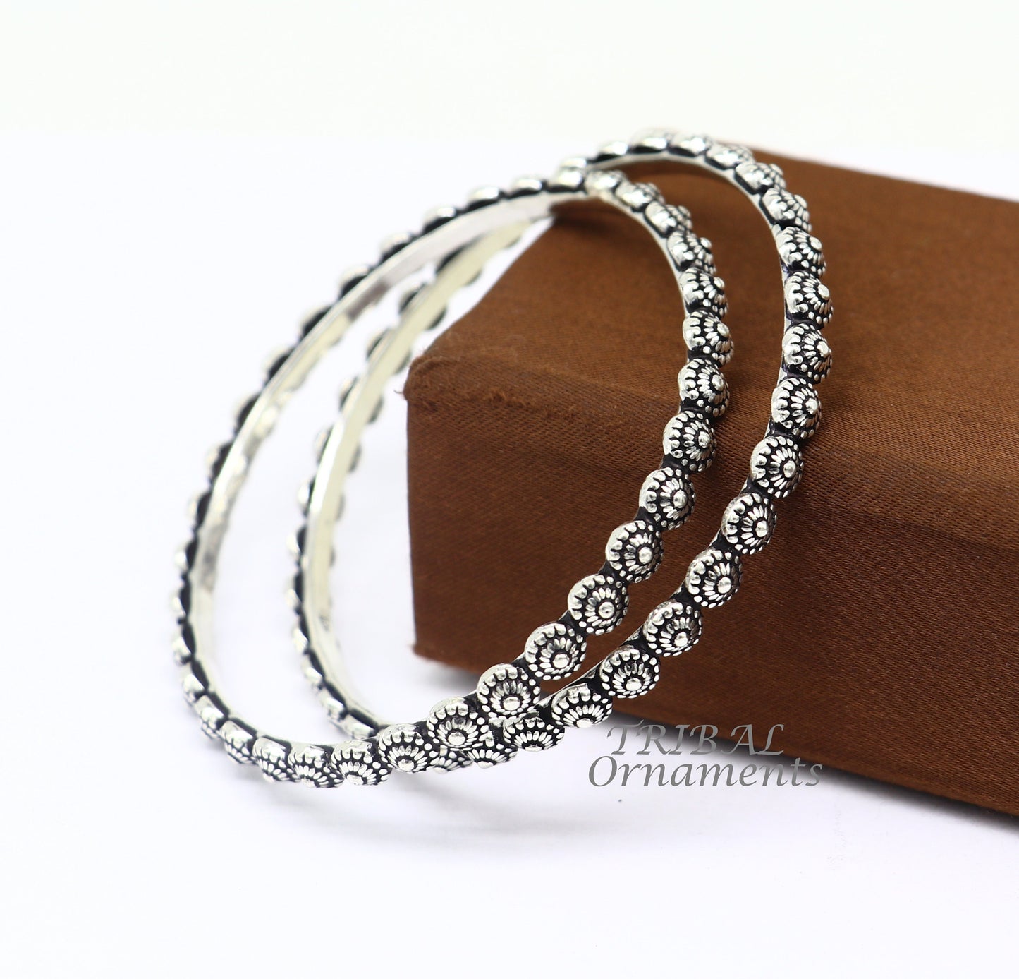 Elegant 925 sterling silver flower design bangle bracelet from TRIBAL ORNAMENTS, handcrafted wedding jewelry for brides.