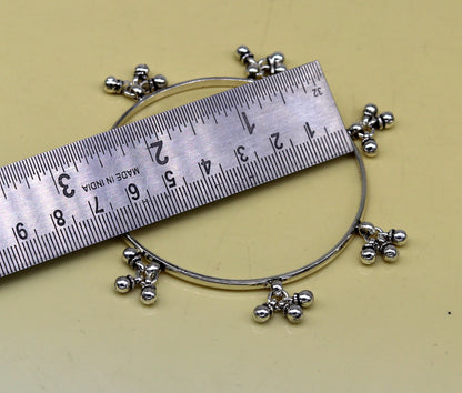 Handmade 925 sterling silver bridesmaid bangle bracelet with hanging bells, personalized tribal jewelry for weddings and gifting.
