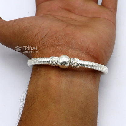 Sterling silver bangle bracelet featuring a plain shine single ball design, handmade tribal jewelry by TRIBAL ORNAMENTS.