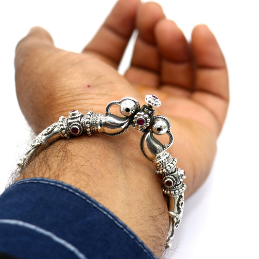 Sterling silver vintage peacock design bangle bracelet with red stones, tribal ethnic jewelry handmade by Tribal Ornaments.
