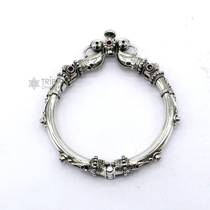 Sterling silver vintage peacock design bangle with red stones, tribal ethnic jewelry by TRIBAL ORNAMENTS, handmade and ornate.