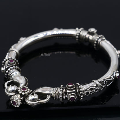 Sterling silver vintage peacock bangle bracelet with red stones, tribal ethnic jewelry, handmade tribal ornament design.