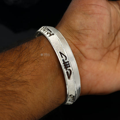 Handmade 999 pure silver men's kada bracelet featuring "Jai Shri Shyam" mantra, traditional divine jewelry by Tribal Ornaments.