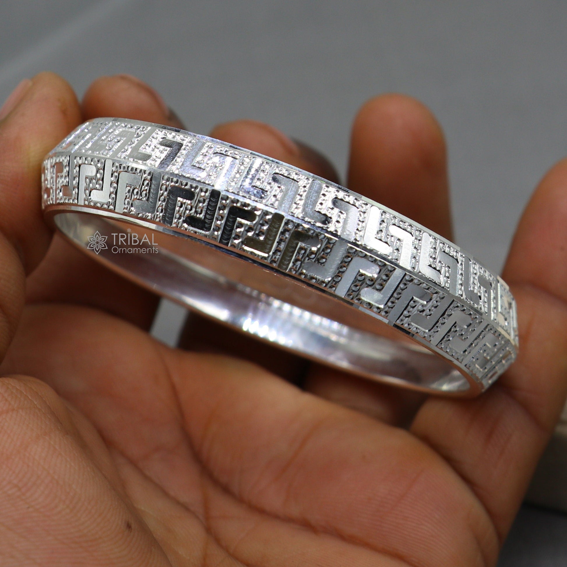 Vintage style 999 pure silver tribal bangle bracelet by TRIBAL ORNAMENTS, showcasing intricate tribal design for men's jewelry.