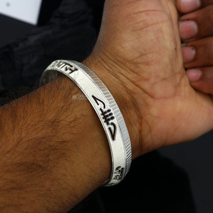 Handmade 999 silver men's kada bracelet featuring the Jai Shri Shyam mantra, crafted by Tribal Ornaments for daily luxury wear.