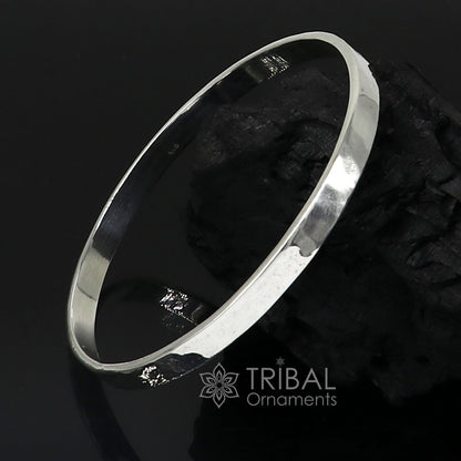 Shiny 925 silver bangle bracelet with a plain flat design, modern trendy style suitable for men and girls by Tribal Ornaments.