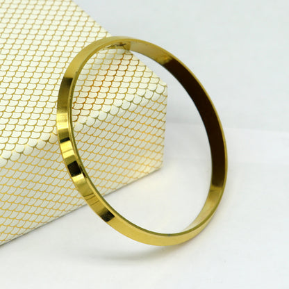 Gold-polished solid silver bangle kada by TRIBAL ORNAMENTS, traditional Sikhha Punjabi jewelry, unisex gift-ready bracelet.