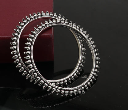 Handmade 925 sterling silver cultural bangle bracelet by TRIBAL ORNAMENTS, featuring intricate designs for brides and special occasions.