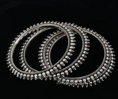 Sterling silver cultural bangle bracelet by TRIBAL ORNAMENTS, handcrafted fashionable jewelry for women and brides
