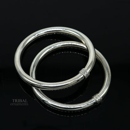 Sterling silver bangle bracelet by Tribal Ornaments, shiny and bright plain design, stylish jewelry for women and girls.