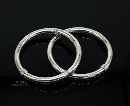 Sterling silver bangle bracelet by Tribal Ornaments featuring a shiny, plain, bright finish, stylish jewelry for women and girls.