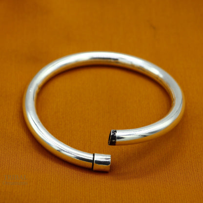 Sterling silver bangle bracelet by Tribal Ornaments, shiny and stylish plain kada for men or girls, ideal for personalized gifting.