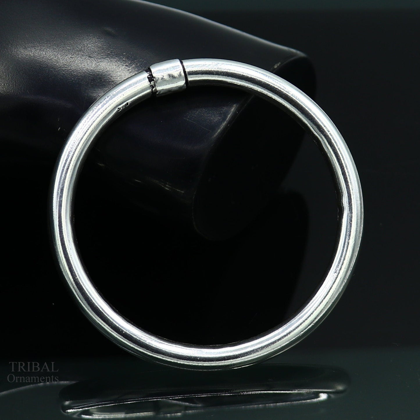 Sterling silver bangle bracelet with shiny finish, stylish and personalized, suitable for men or women, by TRIBAL ORNAMENTS.