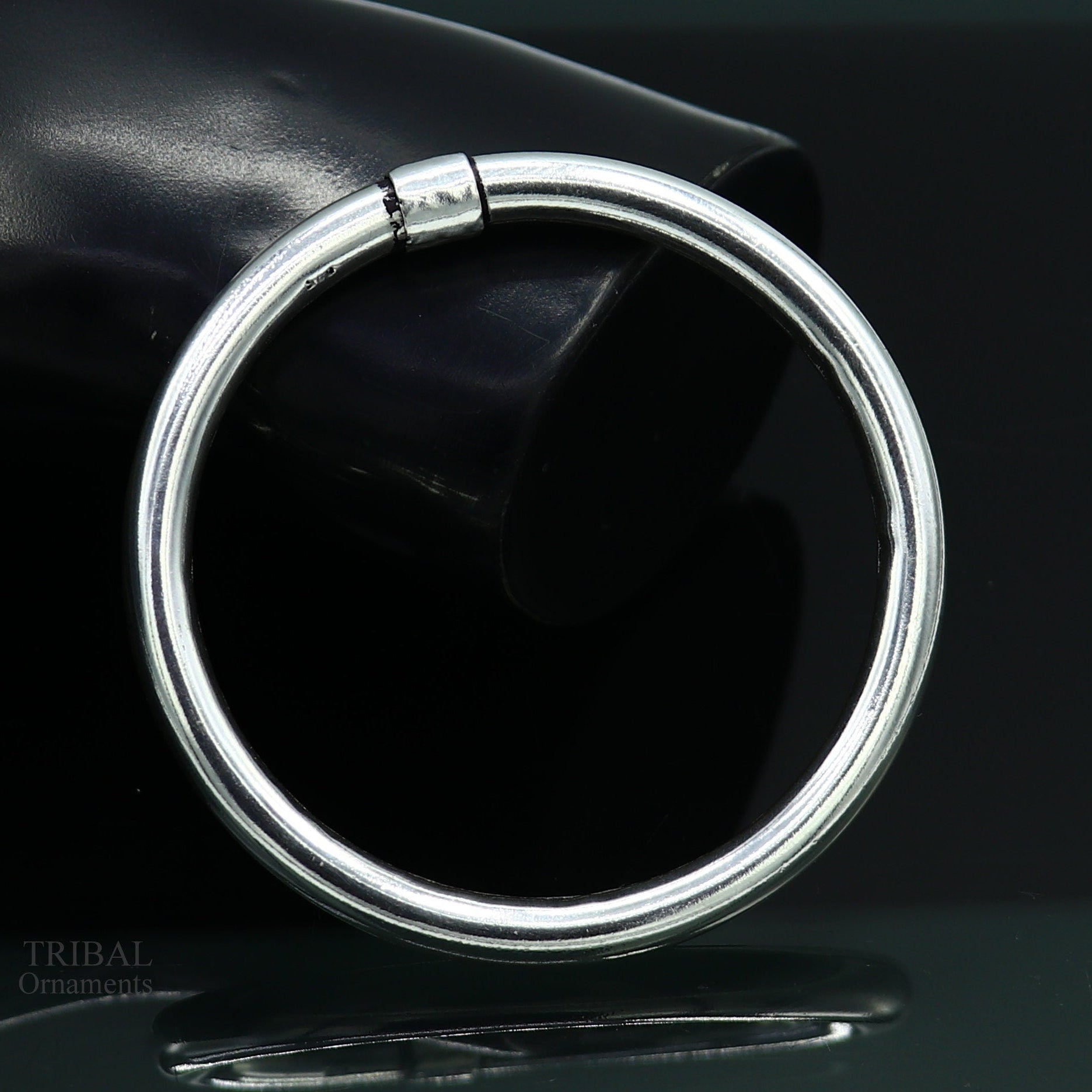 Sterling silver bangle bracelet with shiny finish, stylish and personalized, suitable for men or women, by TRIBAL ORNAMENTS.