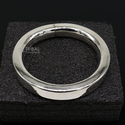 Sterling silver bangle bracelet, shiny and plain, designed for men or girls, from Tribal Ornaments jewelry collection.