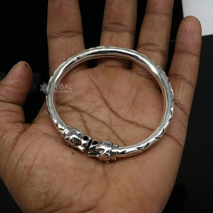 Unisex 925 sterling silver lion face design handcrafted bangle bracelet by Tribal Ornaments, showcasing detailed lion motif.