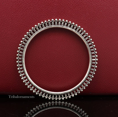 Sterling silver bangle bracelet with tiny beads by TRIBAL ORNAMENTS, featuring handcrafted ethnic jewelry for women.