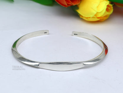 Sterling silver bangle cuff bracelet by TRIBAL ORNAMENTS, shiny, plain design, adjustable, suitable for men and girls.
