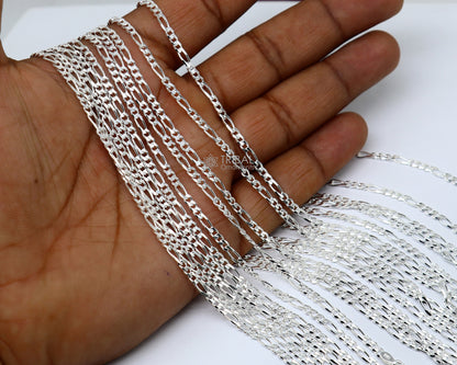 Sterling silver 2.5mm figaro chain in 20 or 24 inches, unisex jewelry with delicate, solid design for versatile styling.