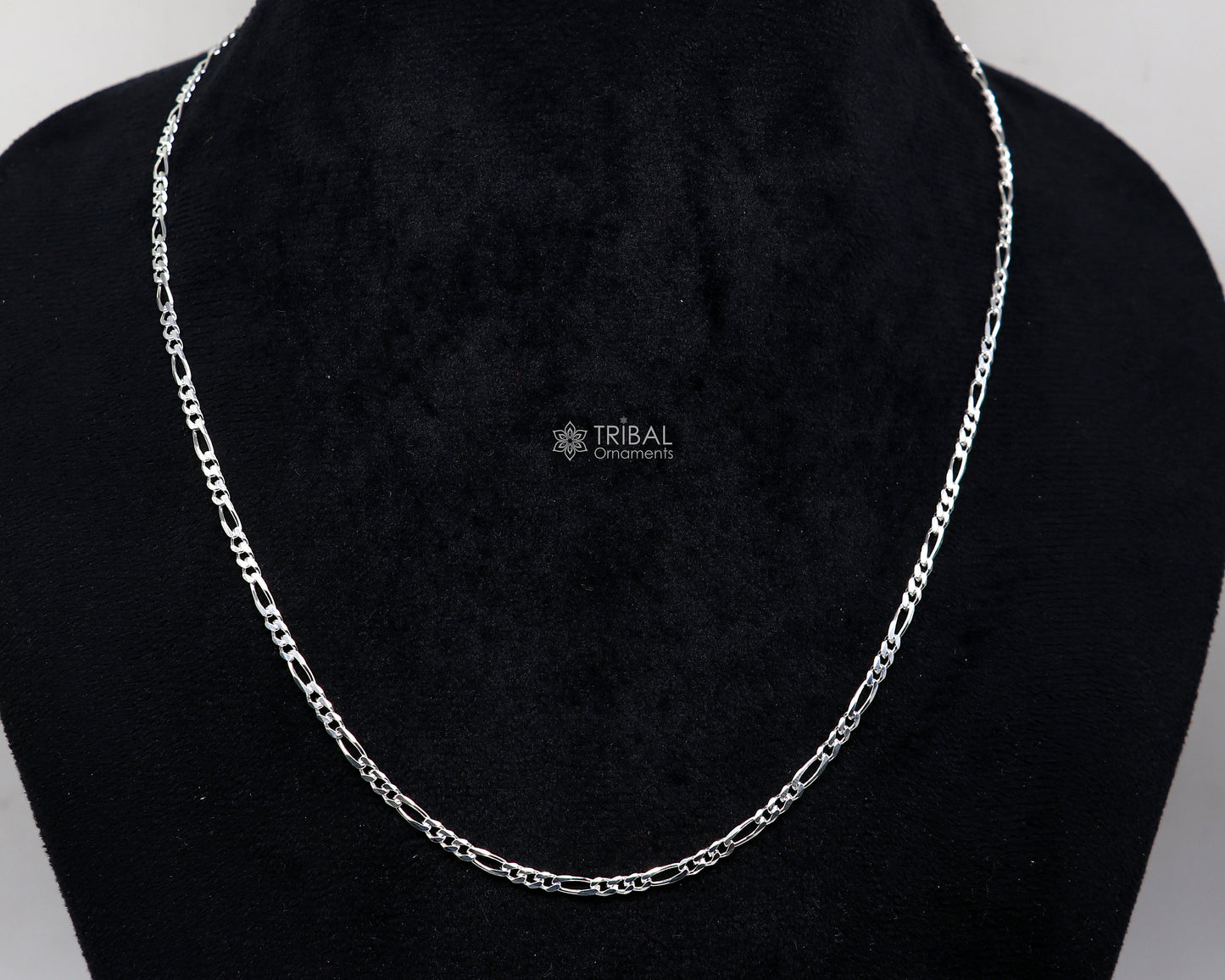 Sterling silver 20 or 24-inch 2.5mm solid Figaro chain by Tribal Ornaments, showcasing delicate unisex jewelry style.