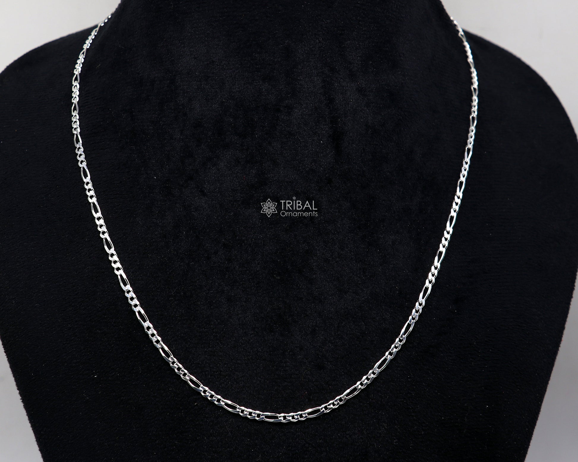 Sterling silver 20 or 24-inch 2.5mm solid Figaro chain by Tribal Ornaments, showcasing delicate unisex jewelry style.
