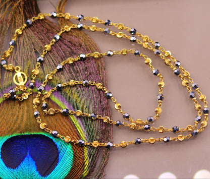 22KT yellow gold handmade mala chain with diamond-cut beads and black stone accents, 24-inch unisex necklace by TRIBAL ORNAMENTS.