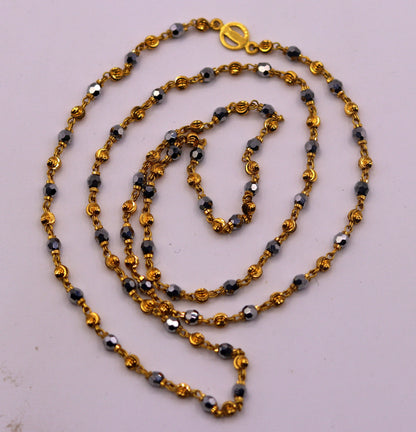 22KT yellow gold handmade mala chain with black stone beads, diamond cut beads, unisex 24-inch necklace, hallmarked by TRIBAL ORNAMENTS.