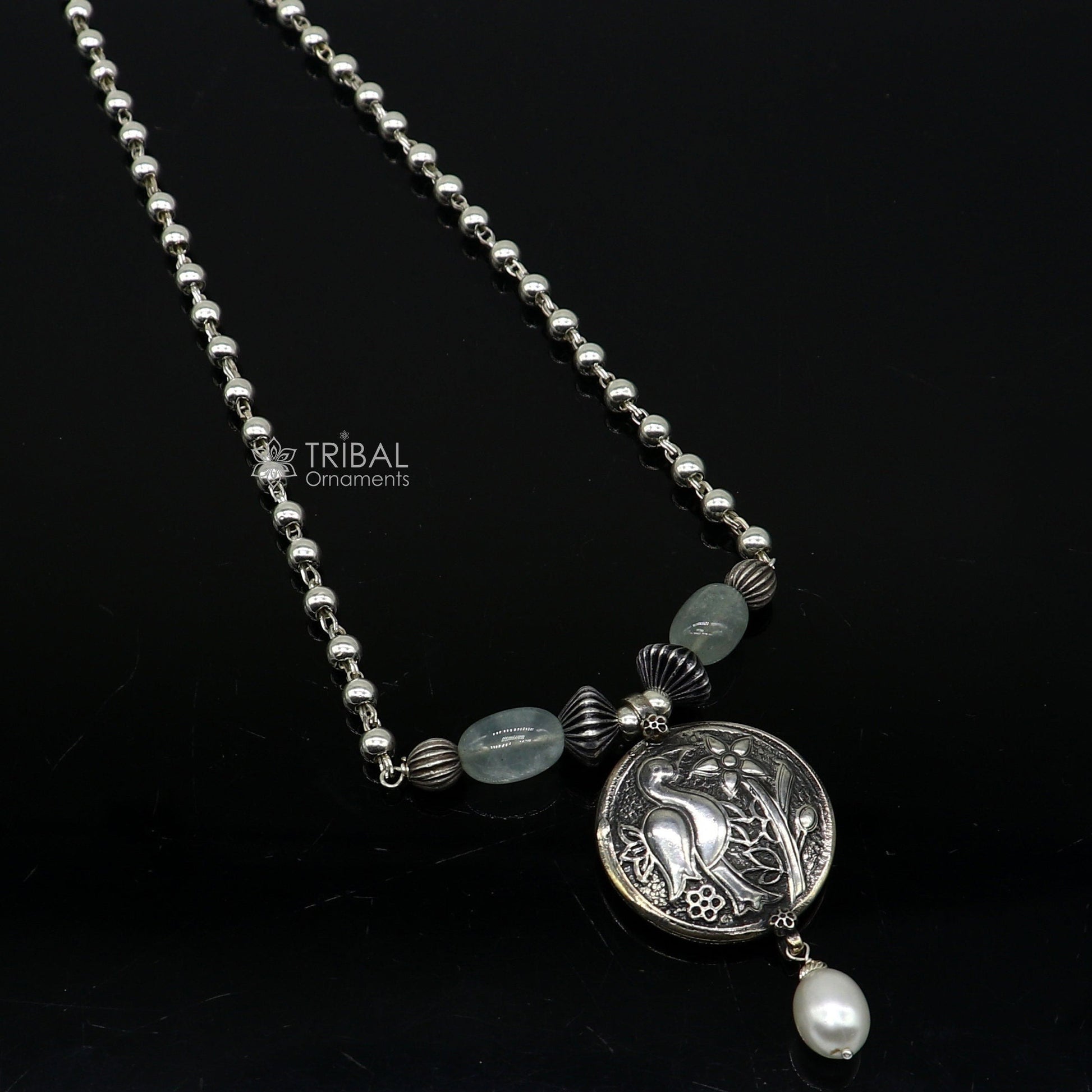 Sterling silver handmade beaded necklace with peacock pendant and hanging drops from TRIBAL ORNAMENTS ethnic tribal jewelry set.