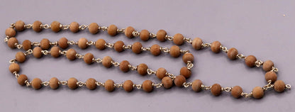 Handmade sandal chandan wood beads with 925 silver chain necklace, traditional prayer jewelry from Tribal Ornaments.