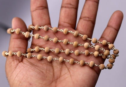 Handmade sandal chandan wood beads and 925 silver chain necklace for prayer, featuring traditional Indian craftsmanship.
