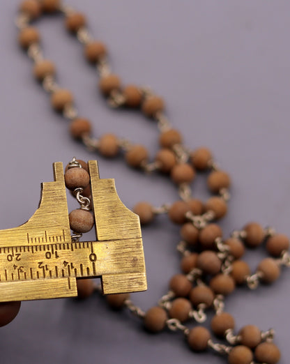 Handmade sandal chandan wood Jaap mala with 925 silver chain for prayer, featuring traditional bead design from India.