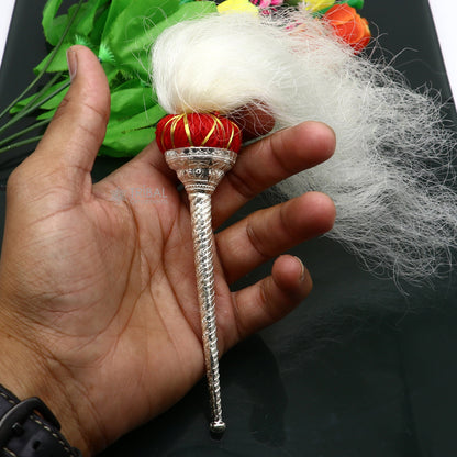 Handmade 925 sterling silver puja chanwar chaur with cow hair, worshipping fan for idols in a home temple setting.