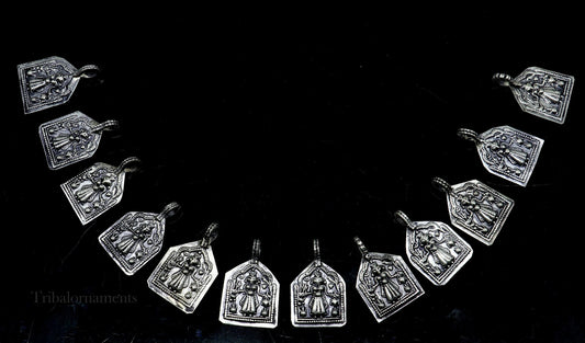 Vintage 925 sterling silver Hindu deity Mataji pendant from TRIBAL ORNAMENTS, intricate handmade tribal jewelry design.