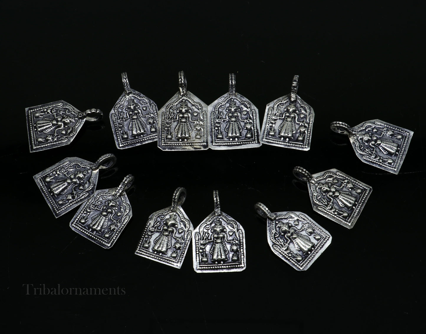 Sterling silver vintage Hindu deity Mataji pendant by TRIBAL ORNAMENTS, handcrafted tribal jewelry accessory with detailed design.