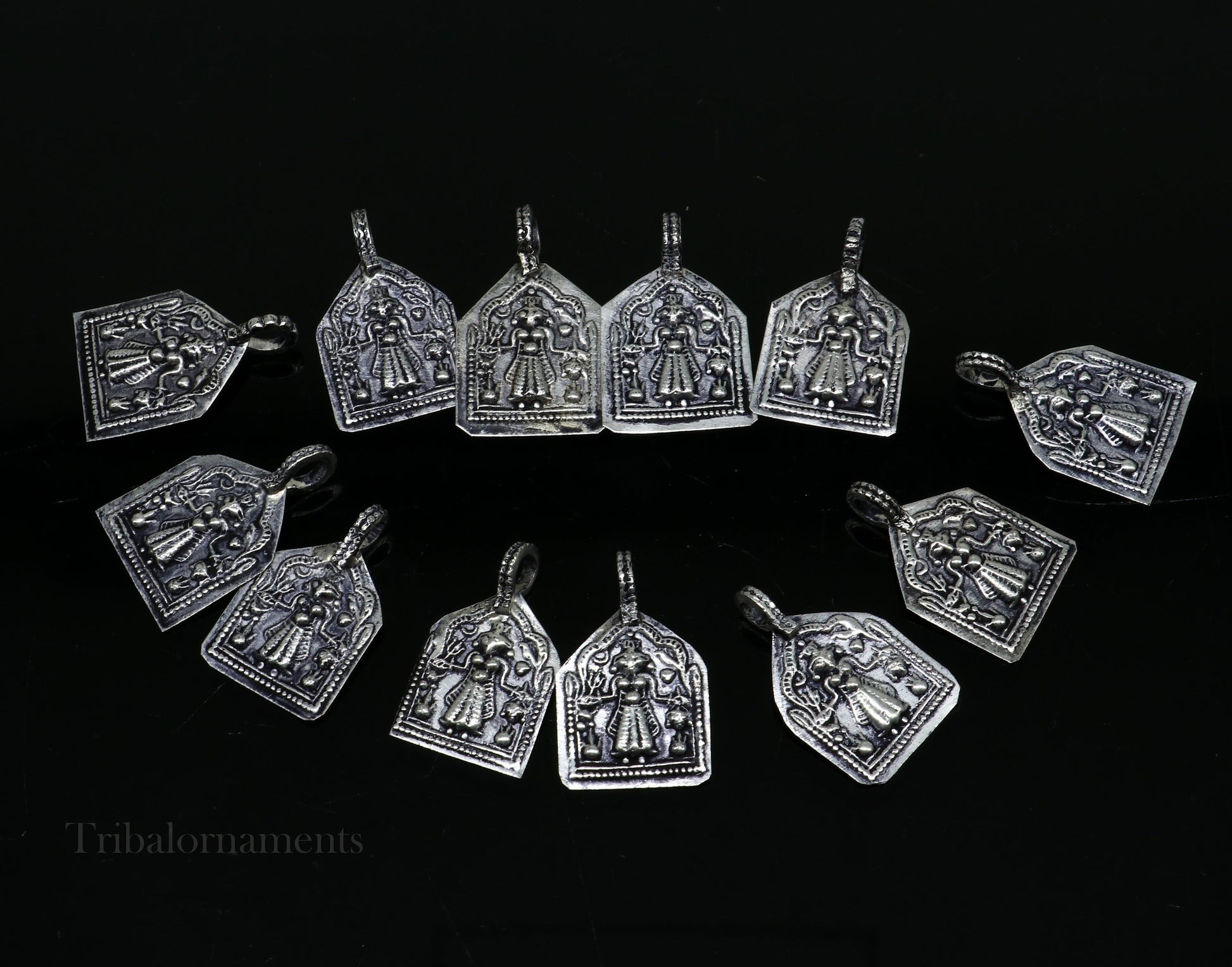Sterling silver vintage Hindu deity Mataji pendant by TRIBAL ORNAMENTS, handcrafted tribal jewelry accessory with detailed design.