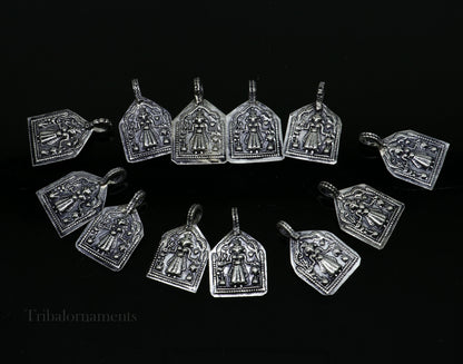 Sterling silver vintage Hindu deity Mataji pendant by TRIBAL ORNAMENTS, handcrafted tribal jewelry accessory with detailed design.