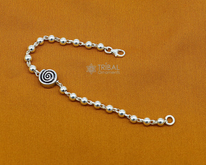 Sterling silver beaded bracelet or anklet for girls and kids, featuring a silver Nazariya design by TRIBAL ORNAMENTS.