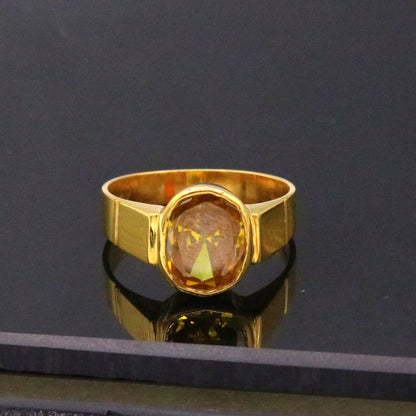 22k yellow gold handmade ring with a vibrant yellow citrine sunela stone, traditional jadau jewelry from Rajasthan, India.