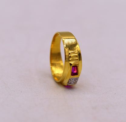 22KT yellow gold handmade Jadau stone ring band from Rajasthan, unisex traditional jewelry with intricate design by Tribal Ornaments.