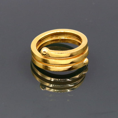 22KT yellow gold handmade spiral ring with vintage antique design, unisex band, showcasing intricate tribal craftsmanship.
