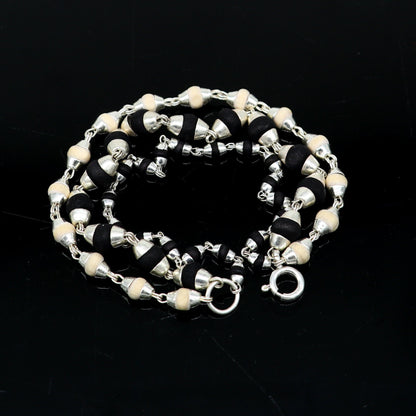 Black and white Tulsi plant wood beaded sterling silver handmade 3-line bracelet by Tribal Ornaments.