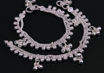 Vintage sterling silver baby anklet with hanging bell charms, handmade tribal design from India, perfect for baby ankle jewelry.