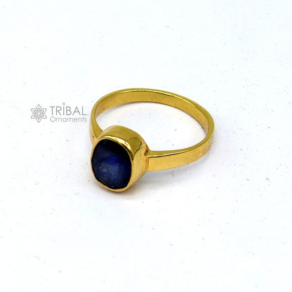Yellow gold handmade unisex ring with blue sapphire (Neelam) zodiac stone, crafted in Rajasthan, India by Tribal Ornaments.