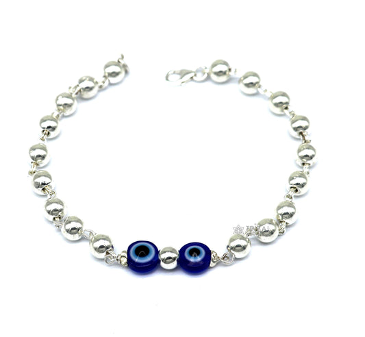 Sterling silver handmade evil eye bracelet with beaded design, unisex cultural jewelry by TRIBAL ORNAMENTS in all sizes.