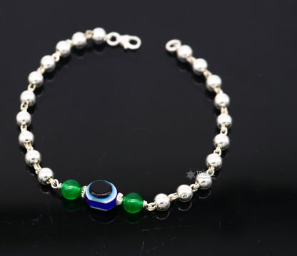 Unisex handmade 925 sterling silver evil eye bracelet with beaded design, stylish tribal jewelry by TRIBAL ORNAMENTS.