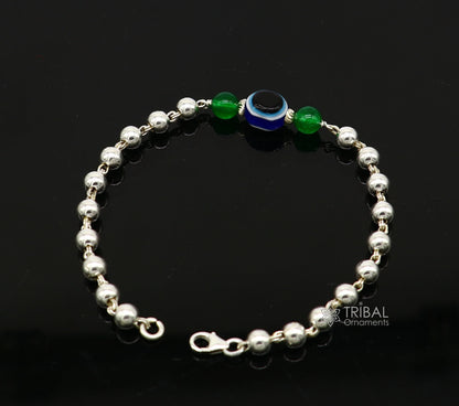 Unisex 925 sterling silver beaded evil eye bracelet with handmade tribal design, trendy jewelry for cultural style.