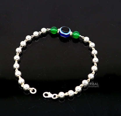 Unisex 925 sterling silver handmade beaded evil eye bracelet with tribal design, stylish and cultural jewelry.