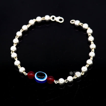 Unisex handmade 925 sterling silver evil eye bracelet with beaded design, stylish and cultural jewelry by TRIBAL ORNAMENTS.